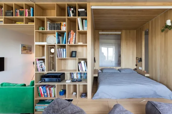 یک "جعبه اتاق خواب" چند منظوره یک اتاق کاملاً جدید و فضای ذخیره سازی برای این آپارتمان کوچک ایجاد می کند!