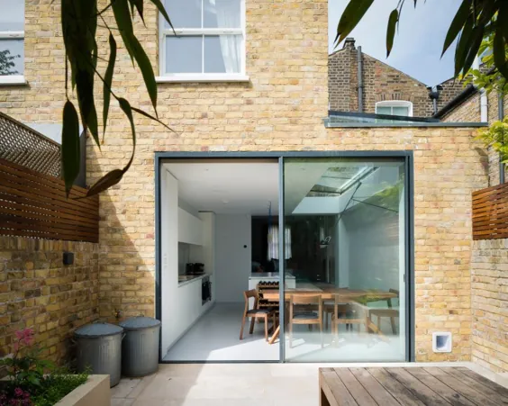 Architecture For London از تخته سنگ و آجر برای پسوند خانه های لندن استفاده می کند