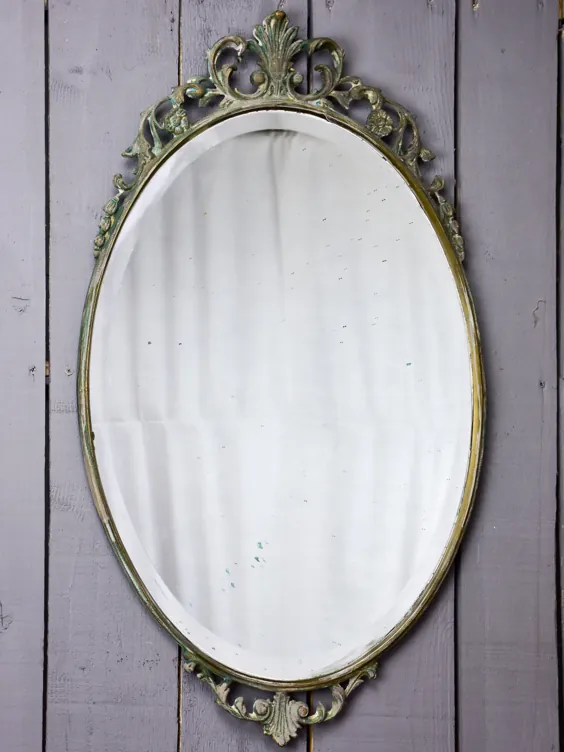 آینه بیضی شکل با قاب آهنی