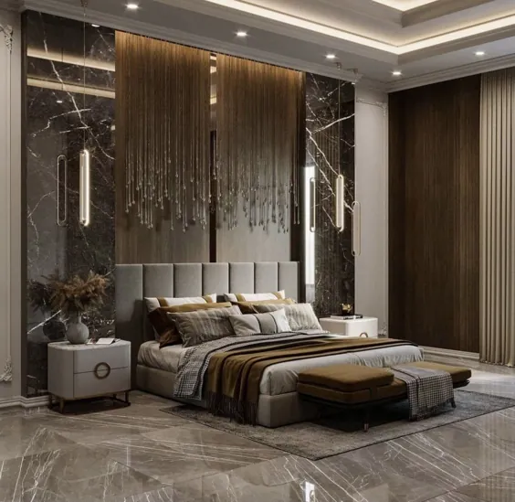 دکوراسیون اتاق خواب مدرن طوسی و طلایی با چراغ های آویز و تخت خواب کانال