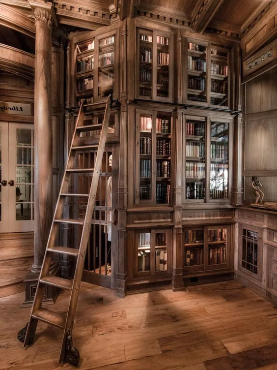 یک کتابخانه خانگی شگفت انگیز ساخته شده از 10 هزار قطعه گردو (تصاویر)