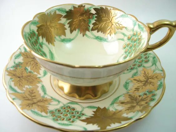 فنجان چای رویال استفورد و نعلبکی عاج و چای طلایی و سبز |  اتسی