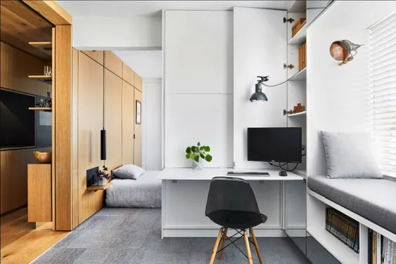 این آپارتمان با متراژ 35 متر اتاق خواب را در پشت دیوارهای کشویی پنهان می کند