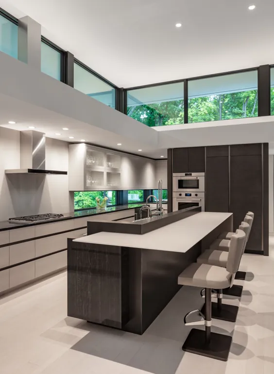 آشپزخانه مدرن و گرم توسط CRS Architects