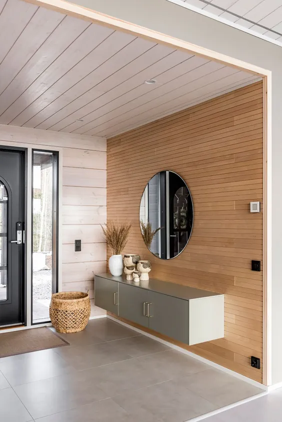 یک خانه چوبی معاصر با فضای داخلی مدرن و الهام گرفته از طبیعت