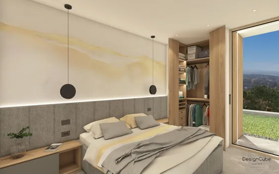 یک اتاق خواب مهمانی با رنگ خاکستری و طلایی