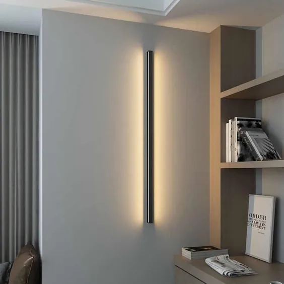 چراغ دیواری خطی مینیمالیستی منجر به نورپردازی اتمسفر برای اتاق نشیمن اتاق خواب هتل می شود