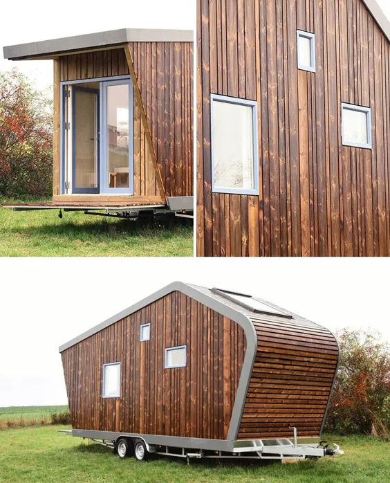 این خانه کوچک مدرن که با چوب پوشانده شده است، در داخل دنج است