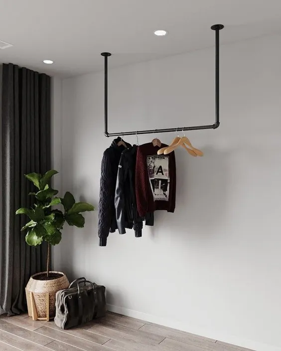 قفسه لباس مینیمالیستی |  ریل پوشاک ساخته شده از فلز نصب شده بر روی سقف قفسه لباس سقف