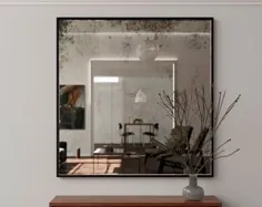 این آینه 55 x40 "این آینه با آینه شیشه ای عتیقه و قاب سیاه است. آینه دیواری بزرگ تزئینی